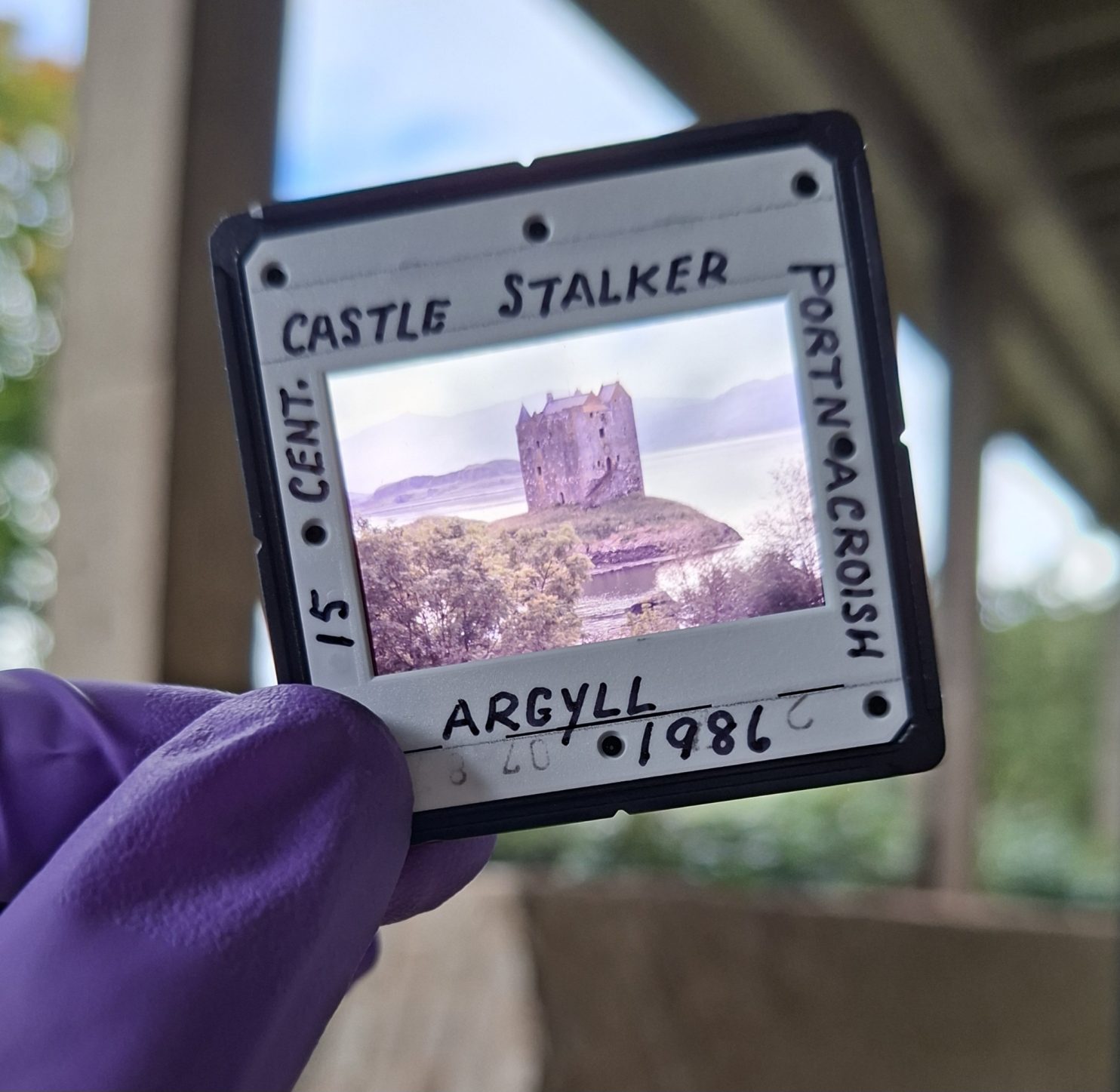 A colour slide of a photograph of Castle Stalker, Argyll, taken in 1986, from the Peter and Margaret Rourke Collection
